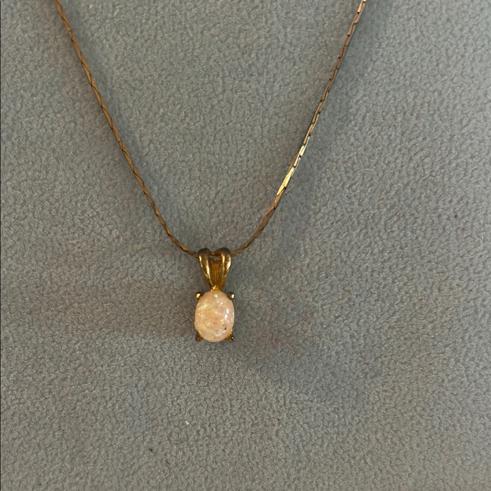 Elegant Gold Necklace with Opal Pendant